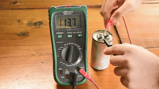 Testing a capacitor using a digital multimeter with capacitance setting